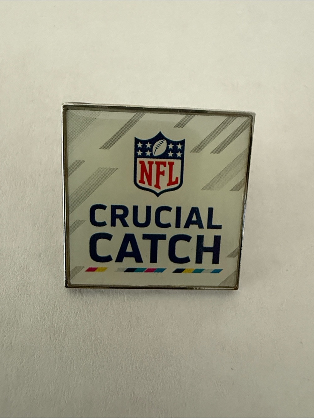 NFL Crucial Catch Brooch in White and Blue with Accent Stripes